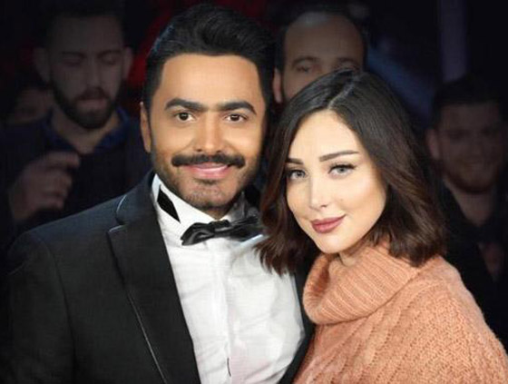 الأزمات تلاحق تامر حسني... اتهامه بالسرقة وانسحاب النجمات وانفصاله عن بسمة بوسيل صورة رقم 4