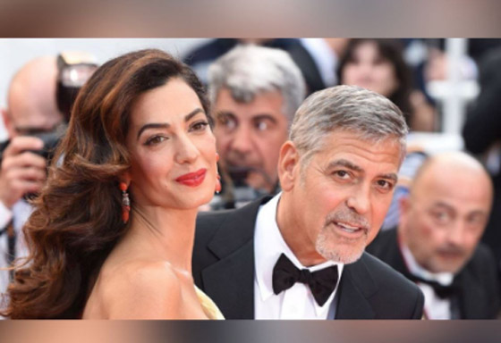 عشاء رومانسي وقبلة حميمة بين جورج كلوني وأمل علم الدين صورة رقم 7