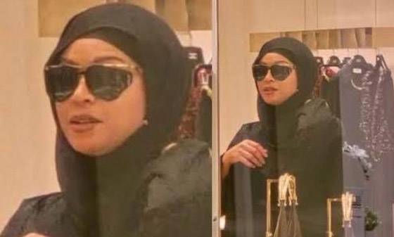 بيونسيه تلفت الأنظار في الدوحة بعباءة سوداء وحجاب... صورة رقم 1