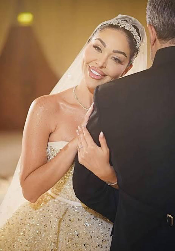  هيا كرزون شقيقة ديانا كرزون بإطلالة ملكية في حفل زفافها على رجل الأعمال عمر الكيكي صورة رقم 3