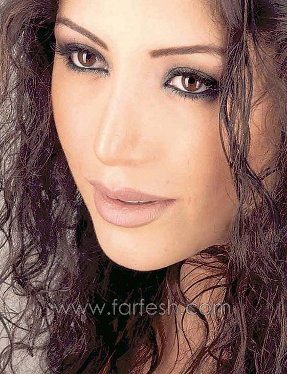 لورا خليل: أعيش حياة طبيعية جداً لا تعرف التصنع!!   صورة رقم 6