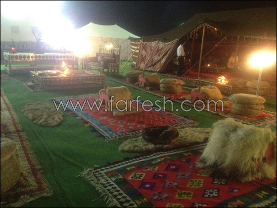 راغب علامة يرتدي العباءة القطرية ويحمل طيرا حرا  صورة رقم 11