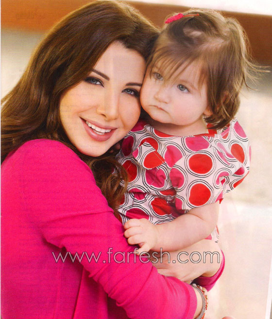 لاول مرة: نانسي عجرم تنشر صورها مع ابنتيها!  صورة رقم 6