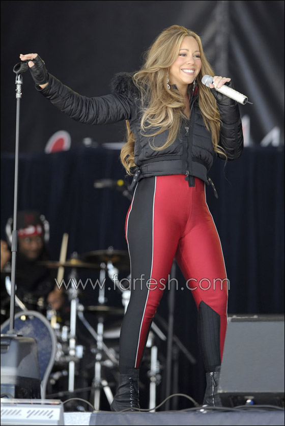 ماريا كاري ترتدي سروالا احمر ضيقا متباهية بقوامها الرشيق  صورة رقم 7