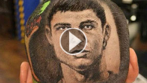 بالفيديو.. حلاق يرسم وجوه لاعبي المونديال بالموس على الرؤوس