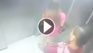بالفيديو.. شاب ينشل حقيبة فتاة ويدفعها خارج المصعد ويهرب