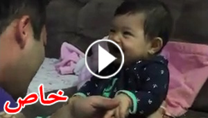 فيديو طريف لأب يحاول قص أظافر طفله الصغير.. شاهد رد فعل الطفل