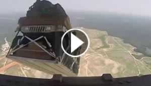 عربات هامر الامريكية خلال هبوطها من السماء الى الارض