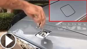 ماذا يحدث اذا حاولت نزع شعار رولز رويس عن غطائها؟! فيديو