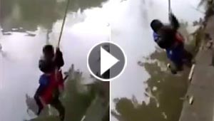 فيديو مثير.. اب مجنون يعاقب ابنه بطريقة غريبة بسبب سوء تصرفه