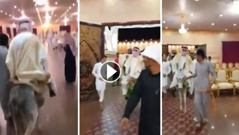 بالفيديو.. عريس يدخل لقاعة الزفاف بطريقة طريفة